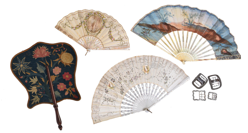 Inline Image - Lot 189: A needlework embroidered and mahogany mounted fan or 'hand screen', second half 18th century, probably English; three assorted hand fans, 19th century; and four assorted metal shoe buckles | Est. £180-220 (+fees)