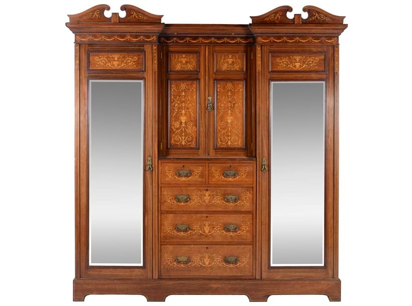 Inline Image - Lot 342: An American walnut and marquetry inlaid compactum wardrobe, circa 1890, in the manner of Edwards & Roberts, retailed by Maple & Co | Est. £500-700 (+fees)