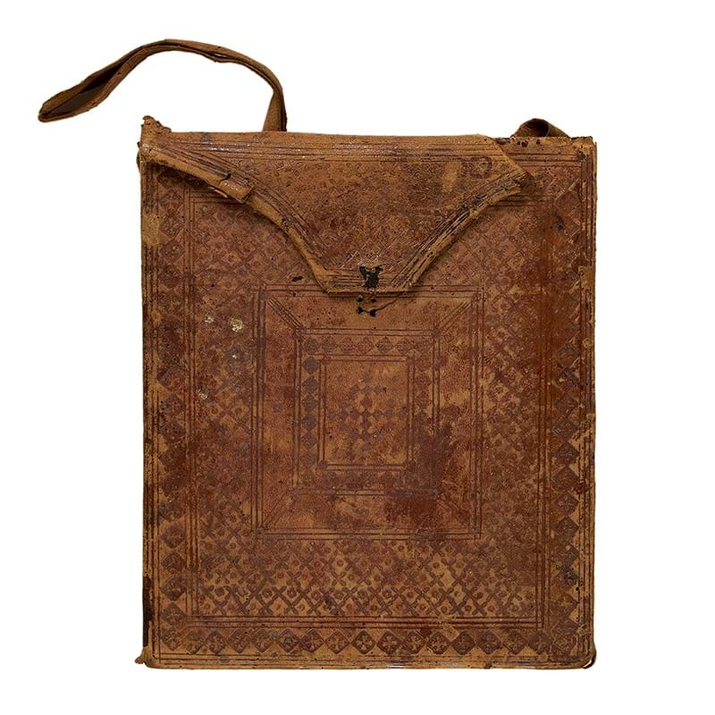 Ornately tooled carrying case, probably for a ledger, made up from manuscript leaves from fourteenth-century paper documents or accounts [Italy (perhaps Florence or its vicinity), second half of fifteenth century]