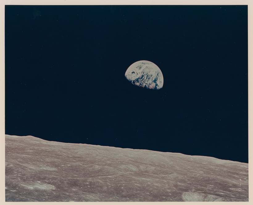 Inline Image - Lot 122: Apollo 8. Earthrise - the first colour photograph of the Earth rising above the Moon's horizon | Est. £3,000-5,000 (+fees)