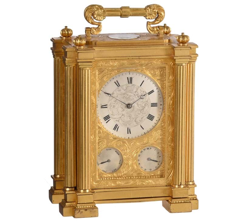 Inline Image - Lot 123: A fine small early Victorian engraved gilt brass small calendar carriage timepiece with twin thermometers and compass, Signed for Storr and Mortimer, London, circa 1835-38 | Est. £3,000-5,000 (+fees)