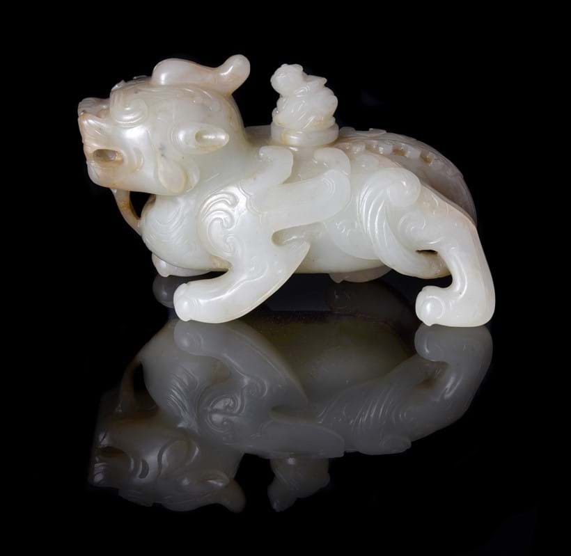 Inline Image - Lot 90: A fine Chinese pale celadon jade Chimera form water pot and cover, late Ming Dynasty, 17th century | Est. £5,000-8,000 (+fees)