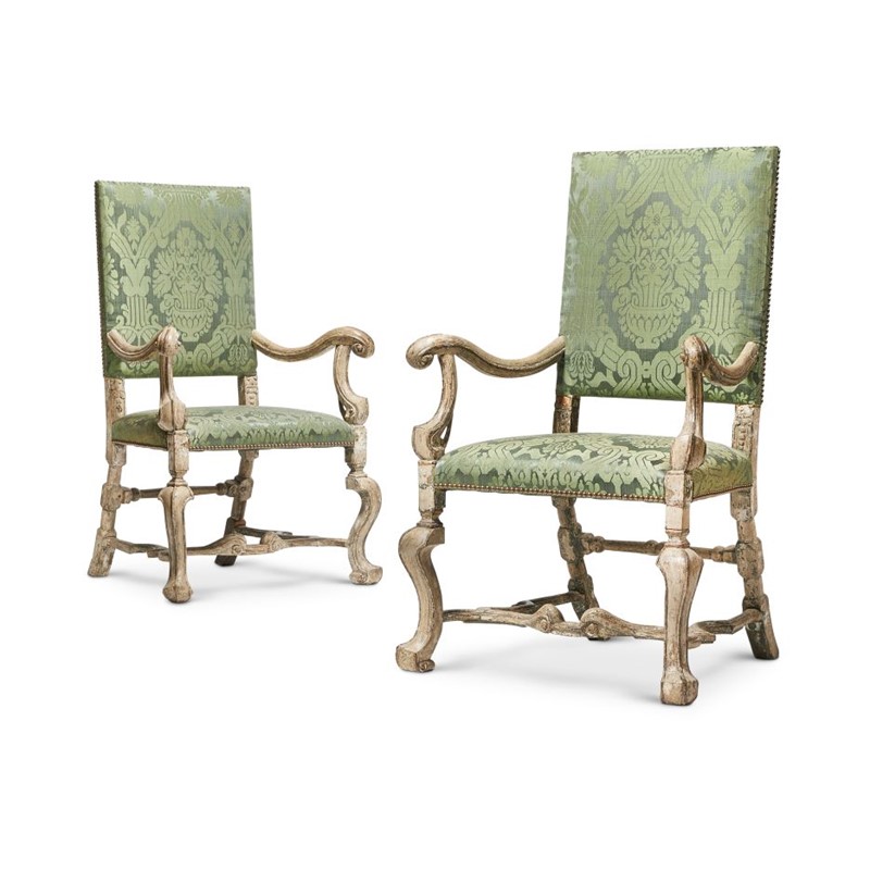 Lot 78: A PAIR OF CARVED WOOD, PAINTED AND SILVERED ARMCHAIRS ONE CIRCA 1700, THE OTHER A LATER COPY