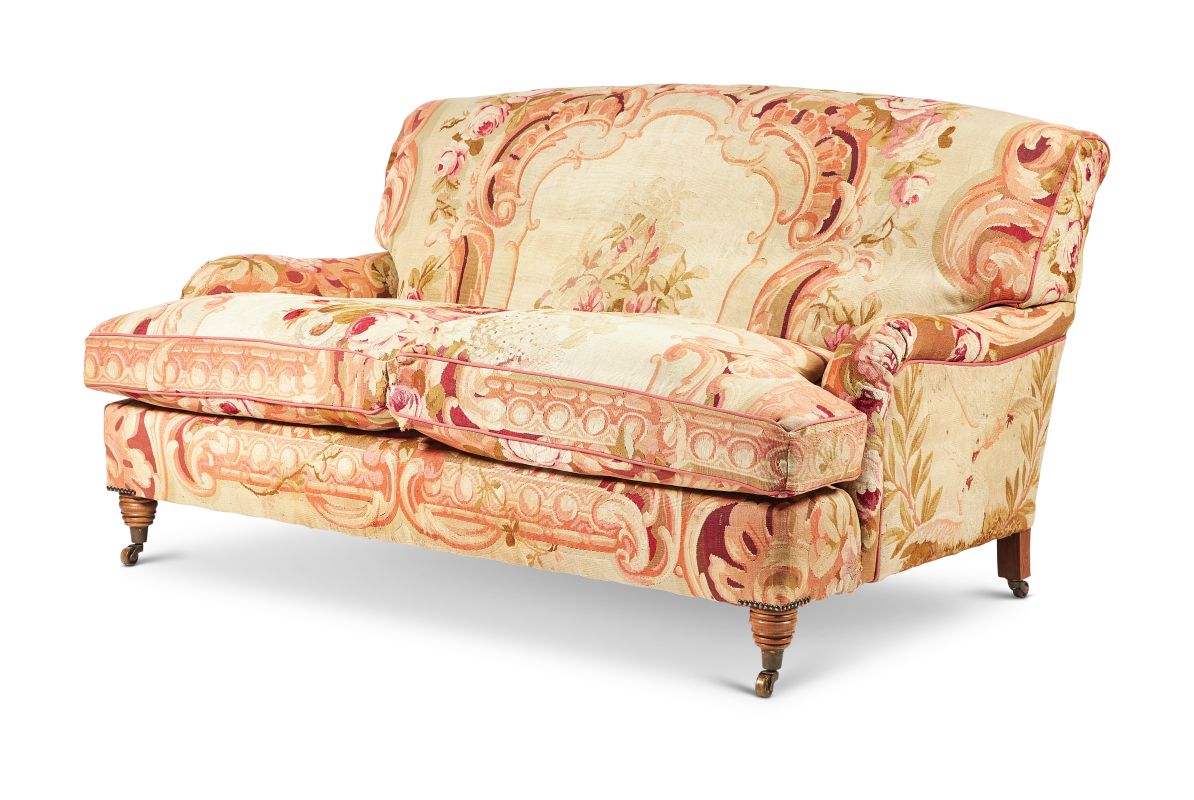 Lot 146: A TWO SEAT SOFA IN HOWARD & SONS STYLE, LATE 20TH CENTURY