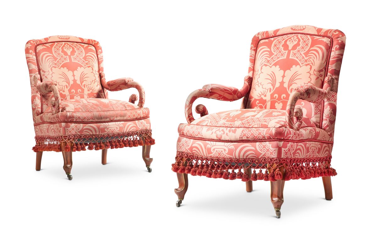 Lot 130: A PAIR OF WALNUT AND PARCEL-GILT FRAMED SALON ARMCHAIRS 