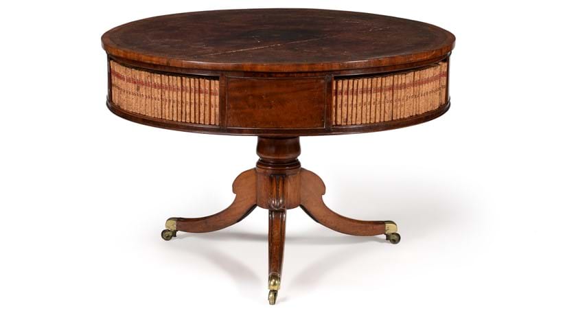 Inline Image - Lot 80: A George IV mahogany drum library table, circa 1825 | Est. £4,000-6,000 (+fees)