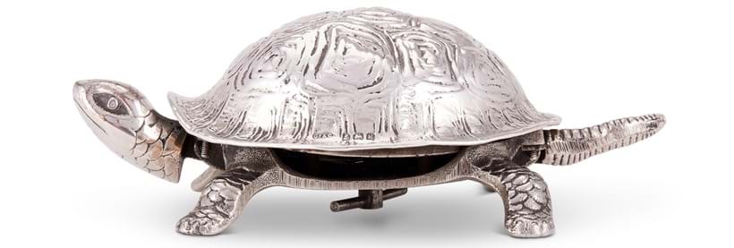 Inline Image - Lot 70: An Edwardian silver mounted novelty tortoise table bell by Grey & Co., Birmingham 1909 | Est. £600-800 (+fees)