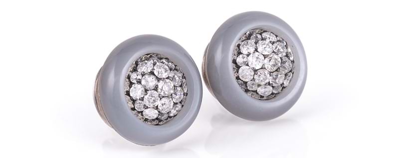 Inline Image - Lot 208: A pair of diamond and grey moonstone cluster ear studs by Hemmerle | Est. £2,000-3,000 (+fees)