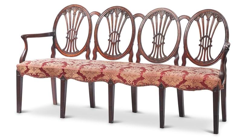Inline Image - Lot 29: A George III carved padouk chair-back settee, Anglo-Chinese, late 18th century | Est. £4,000-6,000 (+fees)