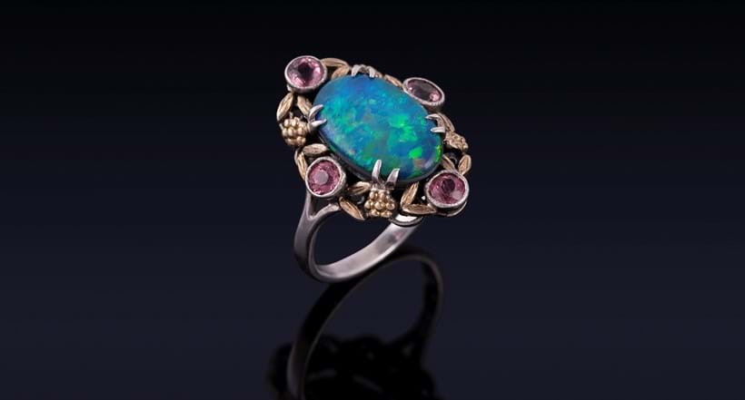 Inline Image - Lot 195: An Arts and Crafts opal doublet and pink tourmaline dress ring in the manner of Bernard Instone, circa 1930 | Est. £300-500 (+fees)