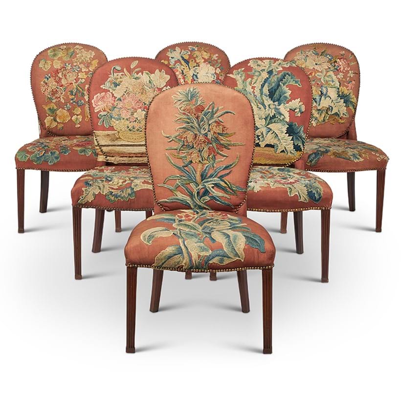 Inline Image - Lot 238: A set of six George III mahogany and upholstered side chairs, circa 1780 | Est. £5,000-8,000 (+fees)