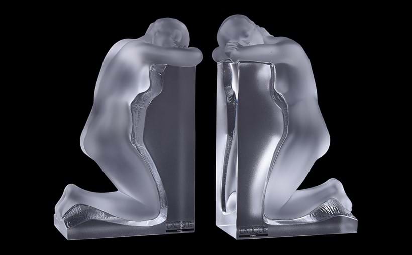 Inline Image - Lalique, Cristal Lalique, Reverie, a pair of clear and frosted glass figural bookends | Est. £800-1,200 (+ fees)