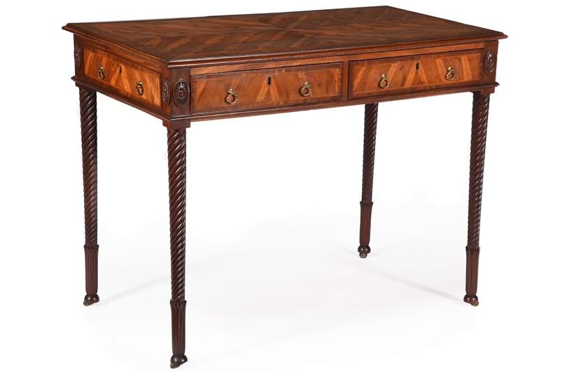 Inline Image - Lot 194: A George III yew wood and mahogany writing table, Attributed to Ince & Mayhew, circa 1780 | Est. £8,000-12,000 (+ fees)