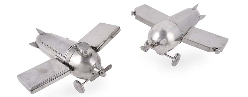 Inline Image - Lot 129: A German silver plated smoker's compendium, designed by J. A. Henckels circa 1930, in the form of a monoplane, Est. £1,500-2,000 (+ fees) | Lot 130: A German cocktail set or 'portable bar', designed by J. A. Henckels circa 1930, in the form of a monoplane | Est. £2,000-3,000 (+ fees)