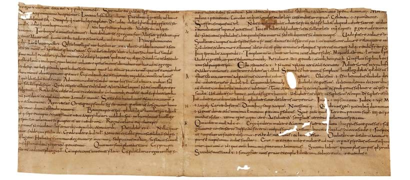 Inline Image - Lot 5: Ɵ Large cutting from a bifolium of a commentary on Matthew, drawing material from lost parts of Frigulus' commentary on the same, in a mixed Carolingian-Insular minuscule, in Latin, manuscript on parchment [northern France, mid-ninth century] | Est. £15,000-20,000 (+ fees)