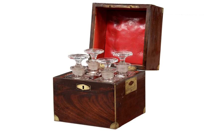 Inline Image - Lot 339: A Victorian mahogany and brass bound campaign four decanter spirit set, mid 19th century | Est. £200-300 (+ fees)
