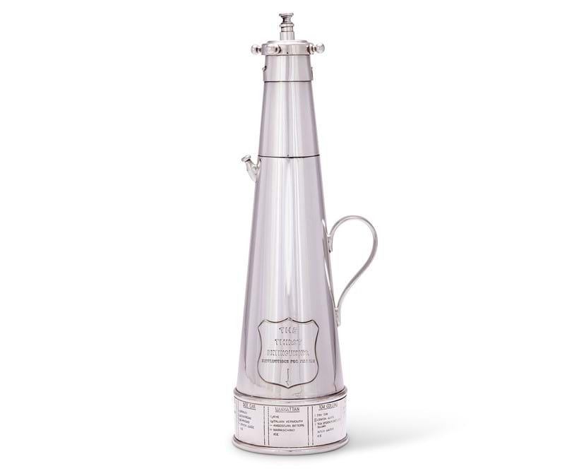 Inline Image - Lot 196: An electro-plated novelty 'Thirst Extinguisher' cocktail shaker, Asprey & Co. Ltd, circa 1930 | Est. £800-1,200 (+ fees)