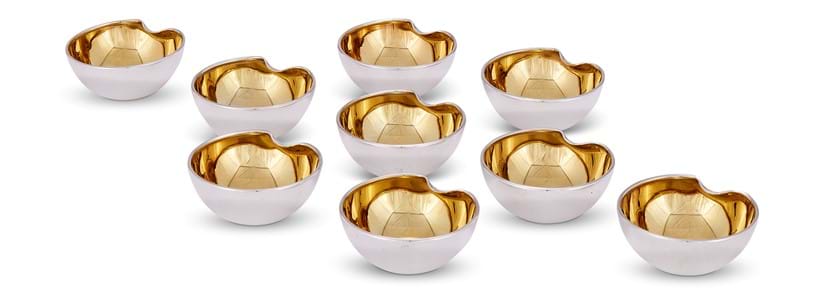 Inline Image - Lot 265: Nine Italian silver thumbprint salt cellars, Elsa Peretti for Tiffany & Co. | Est. £300-500 (+ fees)