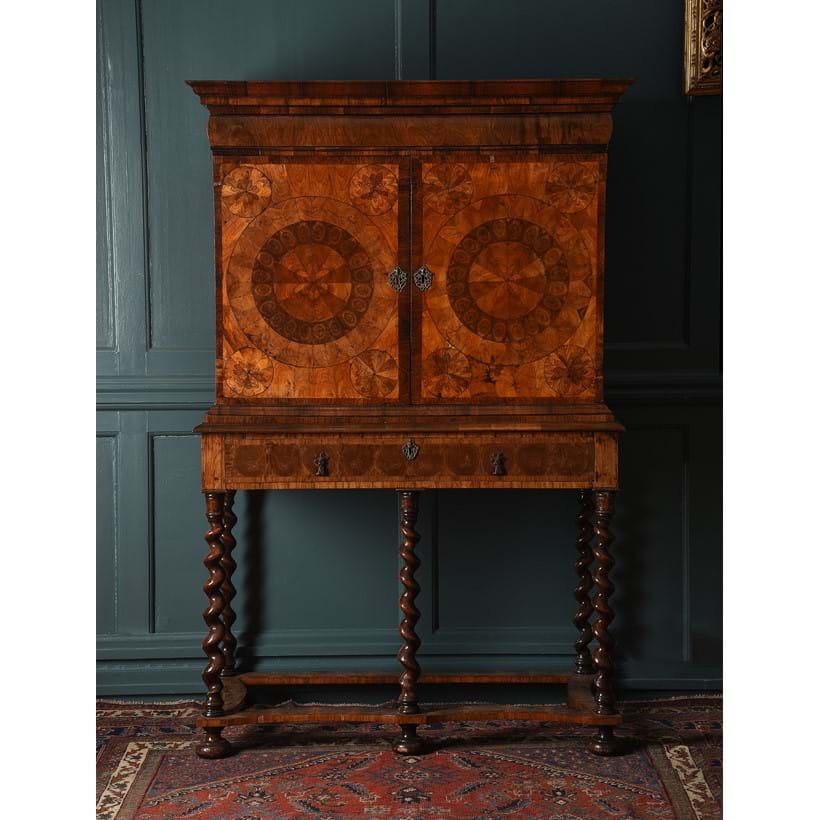 Inline Image - Lot 1: A William and Mary walnut oyster, kingwood and rosewood veneered cabinet on stand, circa 1690 | Est. £4,000-6,000 (+ fees)