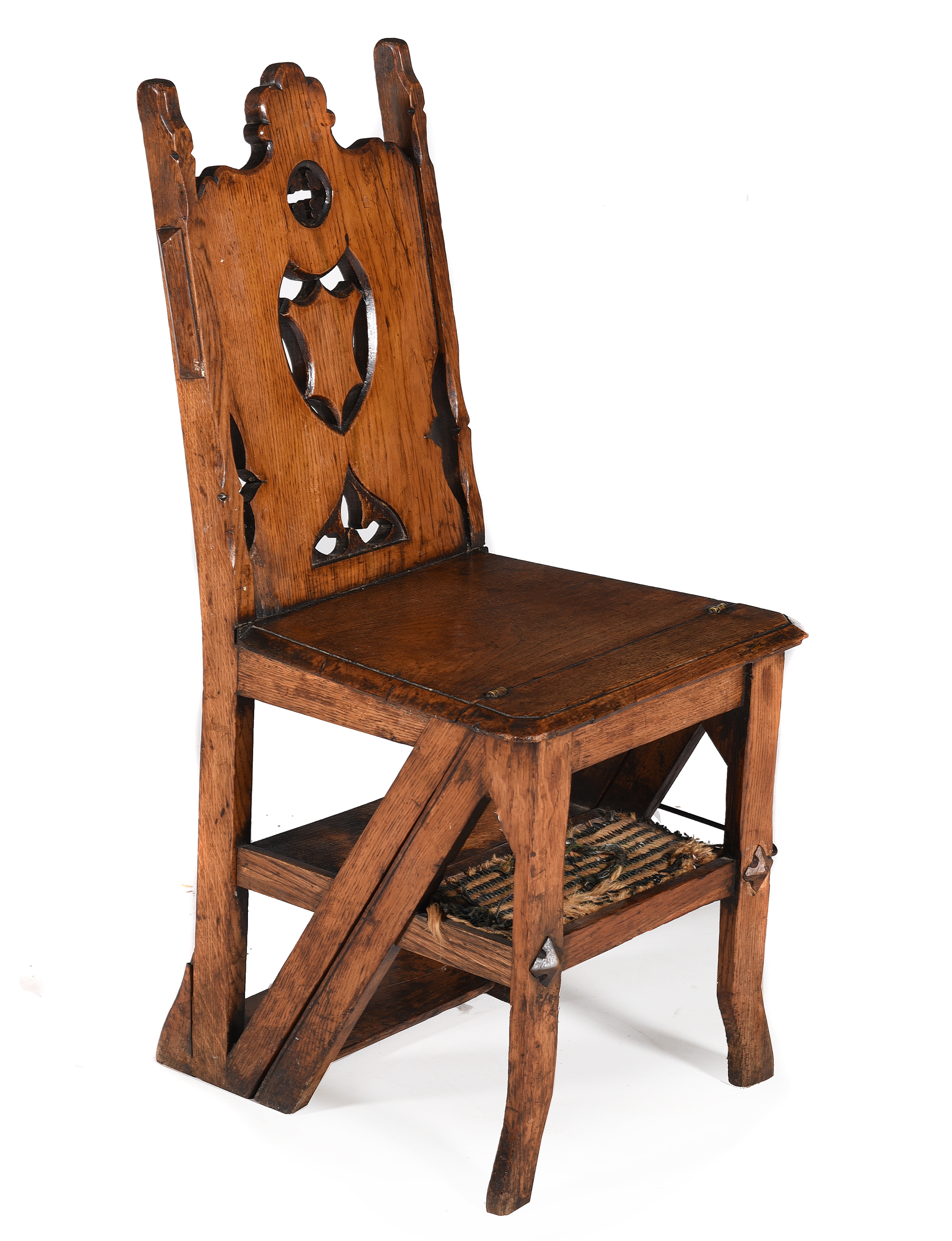 Inline Image - Lot 480: A Victorian oak metamorphic library chair, circa 1880 | Est. £400-600 (+ fees)
