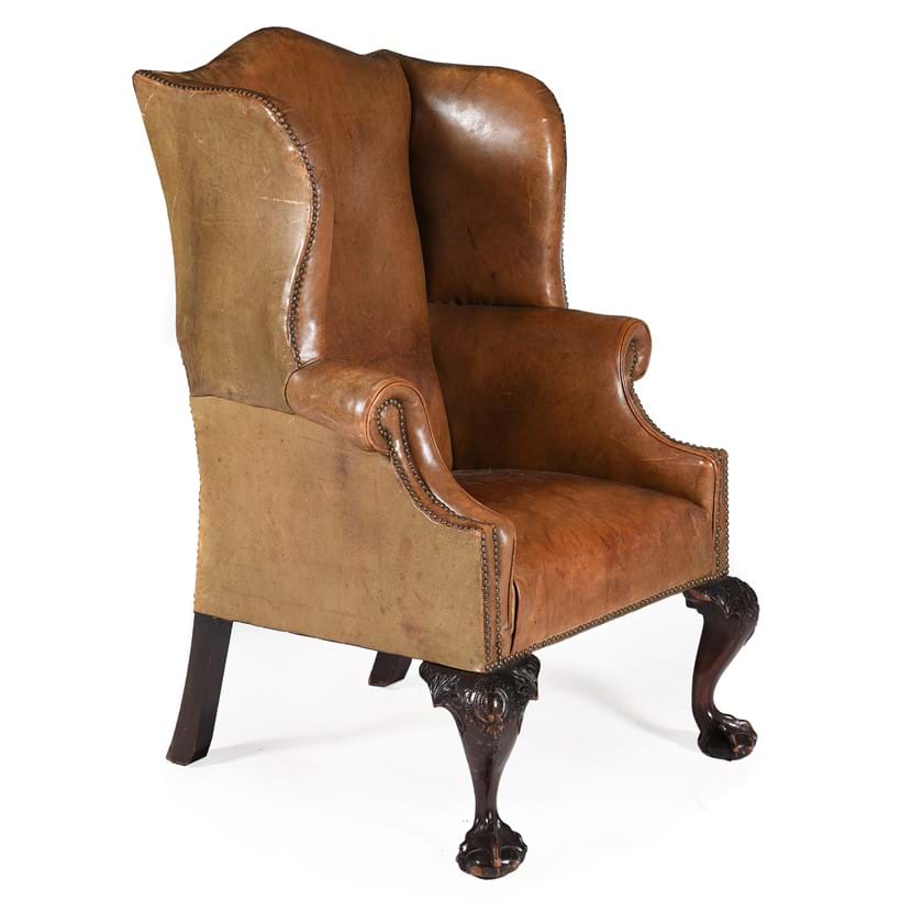 Inline Image - Lot 641: A mahogany and brown leather upholstered armchair in George II style, last quarter 19th century | Est. £400-600 (+ fees)
