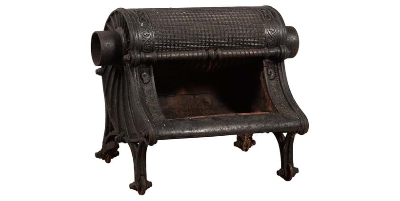 Inline Image - Lot 663: A Victorian cast iron wood burning stove or 'Nautilus Grate', circa 1885 | Est. £200-300 (+ fees)