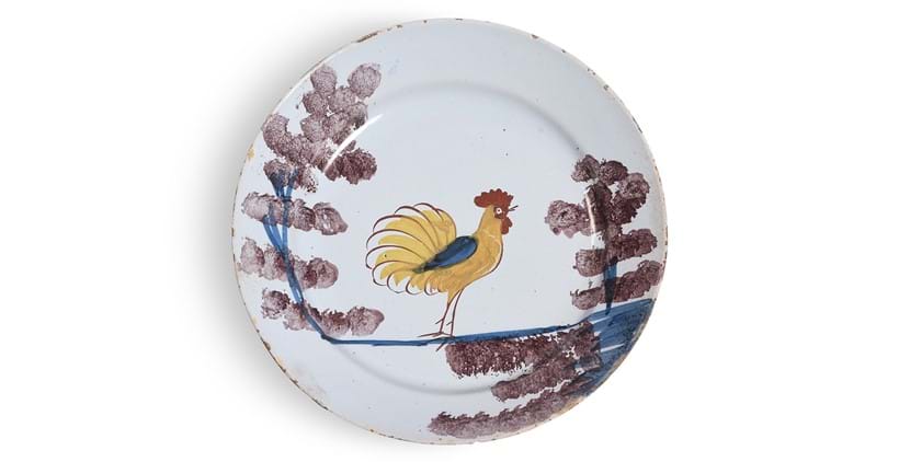 Inline Image - Lot 301: A Bristol Delft 'Farmyard' plate, circa 1730 | Est. £800-1,200 (+ fees)