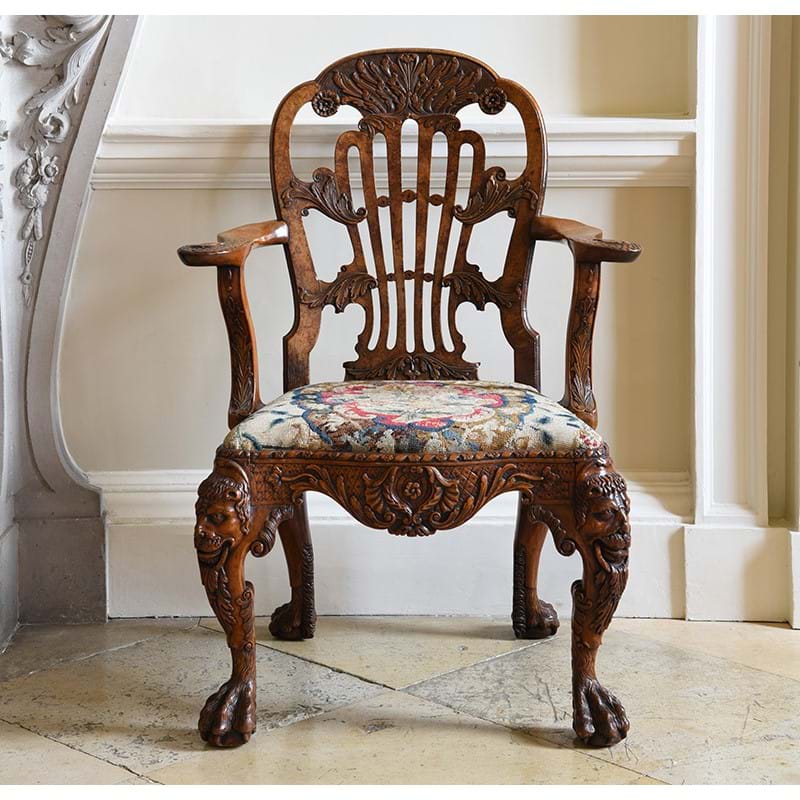 A George II carved walnut open armchair, attributed to Daniel Bell and Thomas Moore, circa 1745 