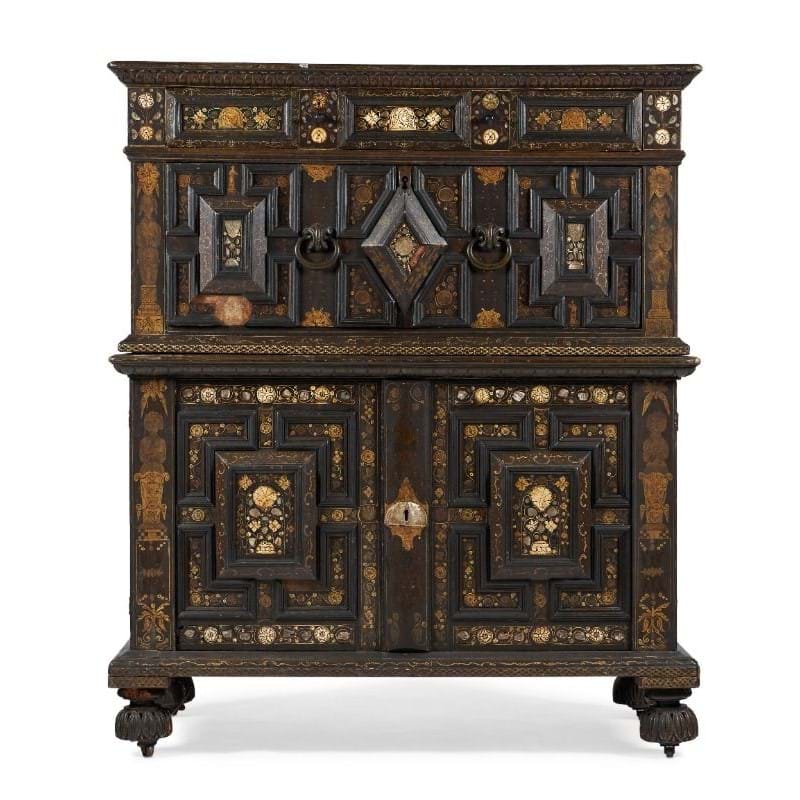 A Charles II painted oak, mother of pearl and bone inlaid enclosed chest of drawers