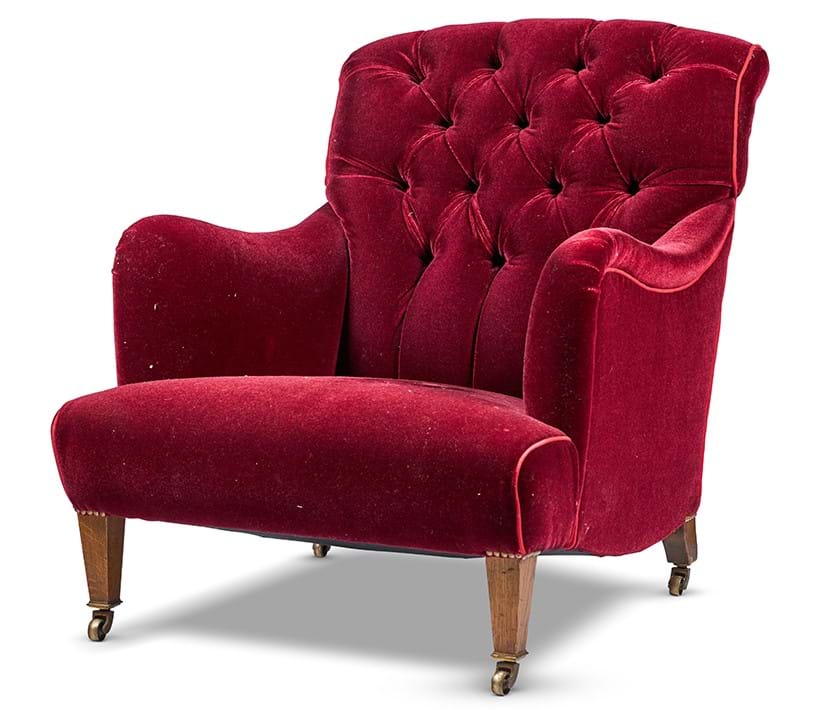 Inline Image - A red velvet armchair by Howard and Sons, circa 1920