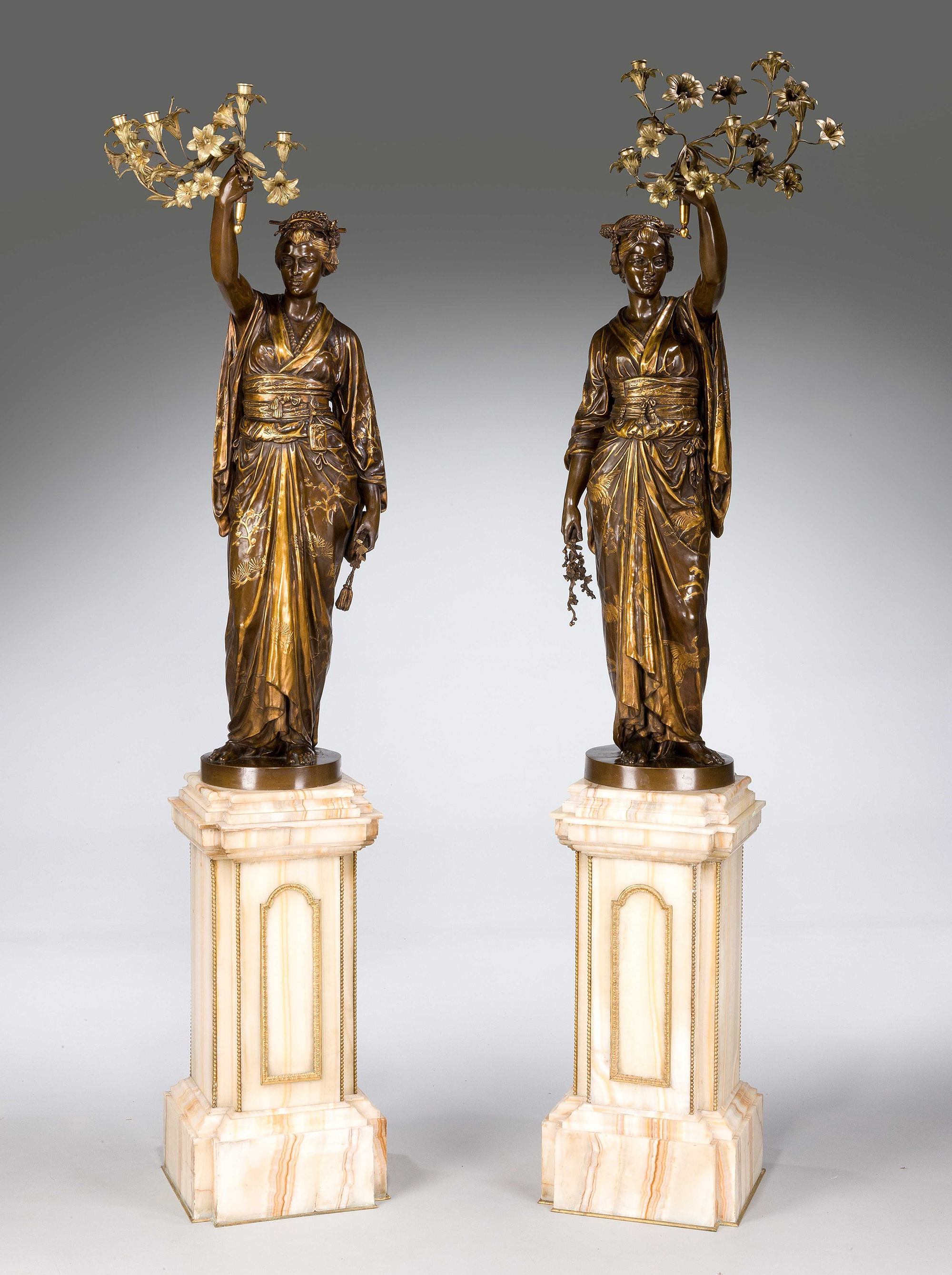 Inline Image - Lot 375: A rare pair of parcel gilt and bronze figural torcheres by Barbedienne and Guillemin, French, circa 1870 | Est. £30,000-50,000 (+ fees)