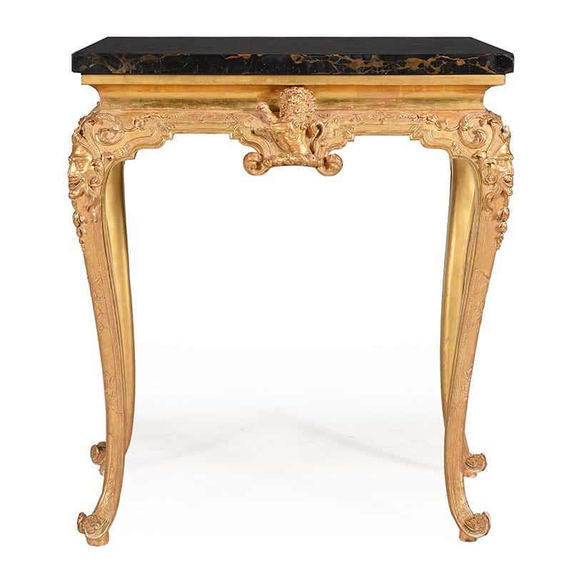 A carved giltwood and gesso side table, circa 1725 and later