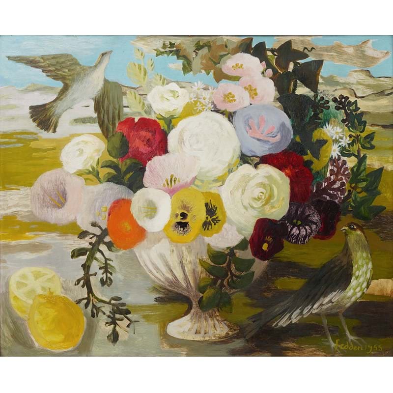 λ Mary Fedden (British 1915-2012), 'Still life of flowers in an urn, birds and a cut lemon in a summer landscape', Oil on board