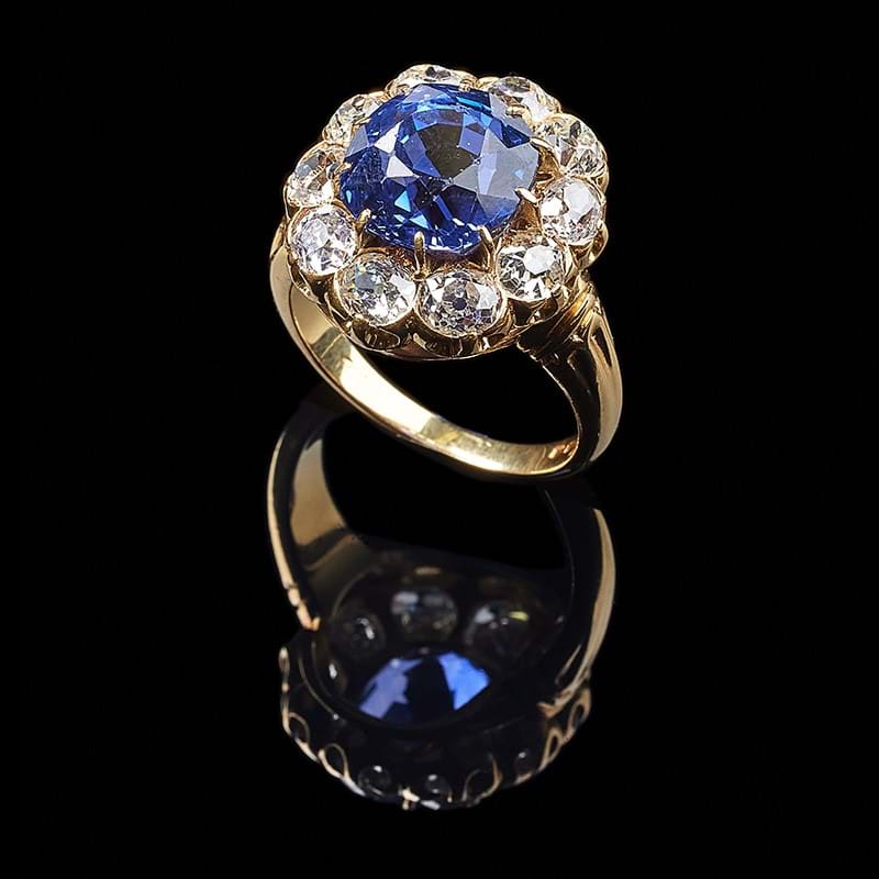 A colour change sapphire and diamond cluster ring, Sri Lanka (Ceylon), no heat
