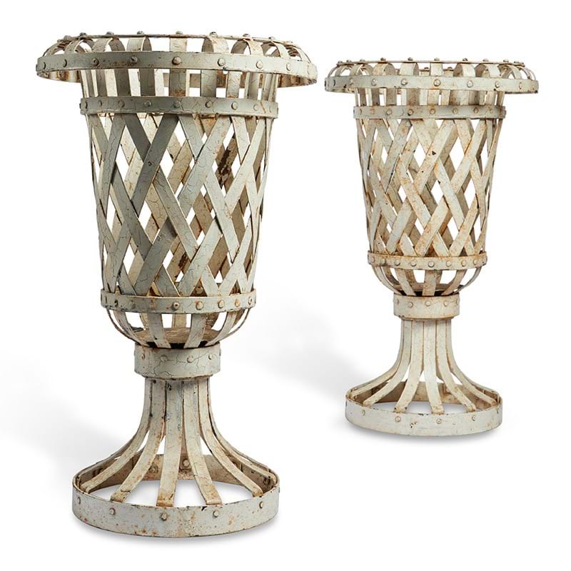 A pair of cream painted urn shaped braziers, modern