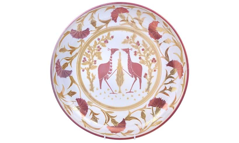 Inline Image - Lot 107: Jonathan Chiswell Jones for JCJ Pottery, a large reduction fired lustre porcelain coupe, fired June 2022, decorated with a stylised birds and fruiting shrubs within a border of stylised carnations | Est. £200-300 (+ fees)