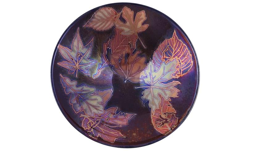 Inline Image - Lot 117: Jonathan Chiswell Jones and Kerry Bosworth for JCJ Pottery, a reduction fired lustre porcelain bowl, fired June 2022, decorated with a mixture of autumn leaves including oak and chestnut | Est. £120-180 (+ fees)