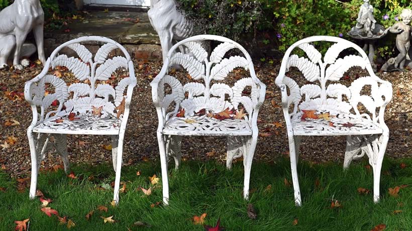 Inline Image - Lot 706: A set of three white painted aluminium garden armchairs, 20th century, after the fern pattern by Coalbrookdale | Est. £600-800 (+ fees)