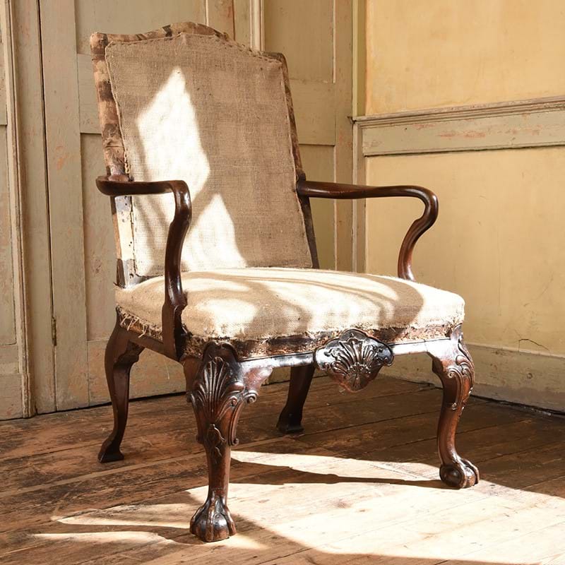 A George II carved walnut open armchair, attributed to James Moore, circa 1730