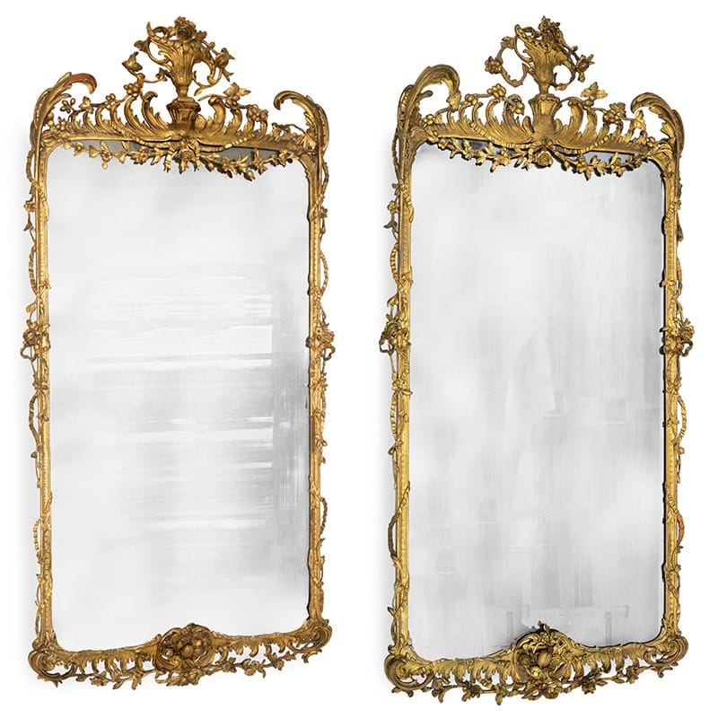 A pair of George III carved giltwood wall mirrors, circa 1805