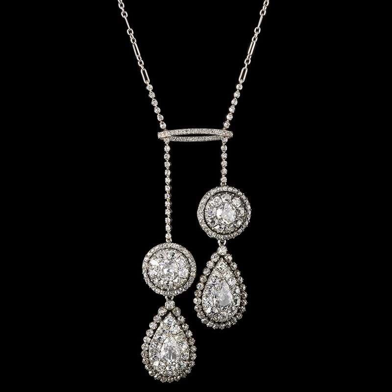 A pair of Georgian diamond cluster drops attached to a later Edwardian diamond set lavallière necklace