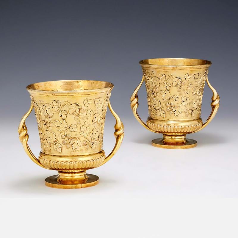 A pair of late George III silver gilt twin handled cups, Paul Storr, London 1817