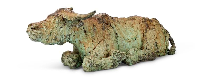 Inline Image - Lot 21: λ Dame Elisabeth Frink (British 1930-1993), 'Lying down Buffalo [FCR367]', Bronze with green and brown patina | Est. £30,000-50,000 (+ fees)