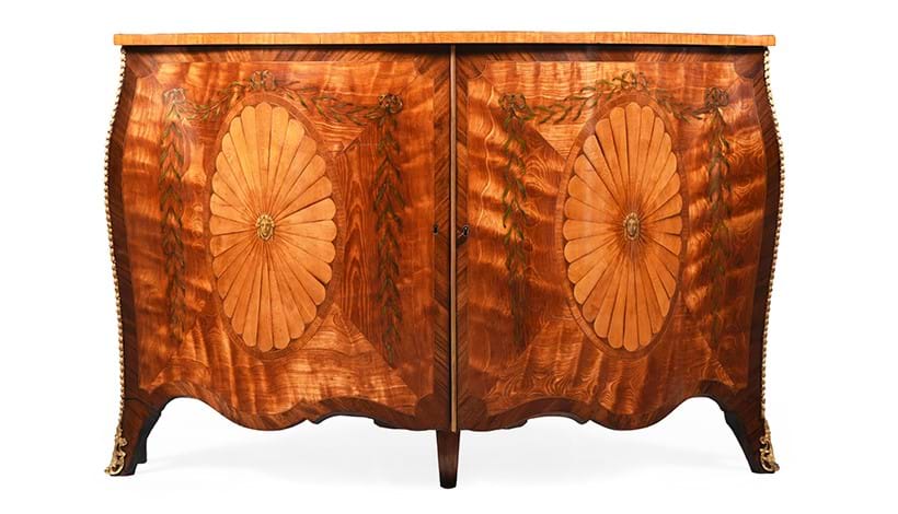 Inline Image - Lot 272: A George III satinwood, marquetry and painted serpentine fronted commode in the manner of Ince & Mayhew, Circa 1780 | Est. £10,000-15,000 (+ fees)