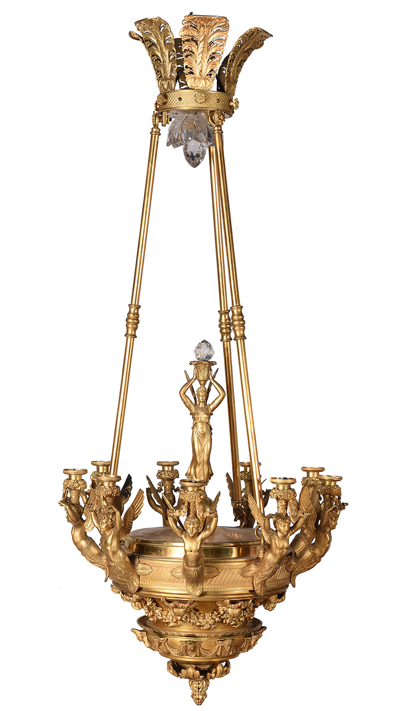 Inline Image - Lot 606: An ormolu nine light chandelier in empire style, late 19th/early 20th century | Est. £1,200-1,800 (+ fees)