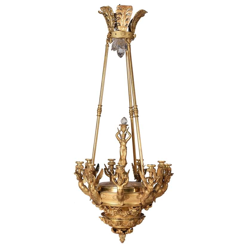 Inline Image - Lot 606: An ormolu nine light chandelier in empire style, late 19th/early 20th century | Est. £1,200-1,800 (+ fees)
