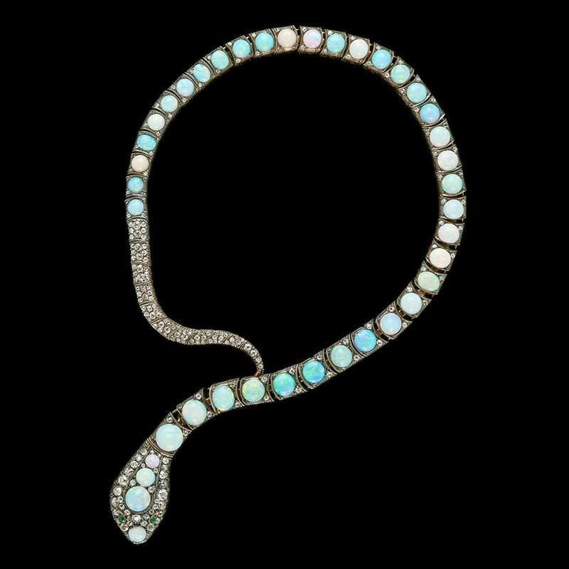 An opal, diamond and emerald serpent necklace