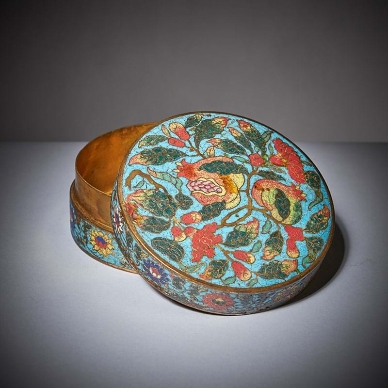 A rare Chinese cloisonné 'pomegranate' box and cover, incised Xuande