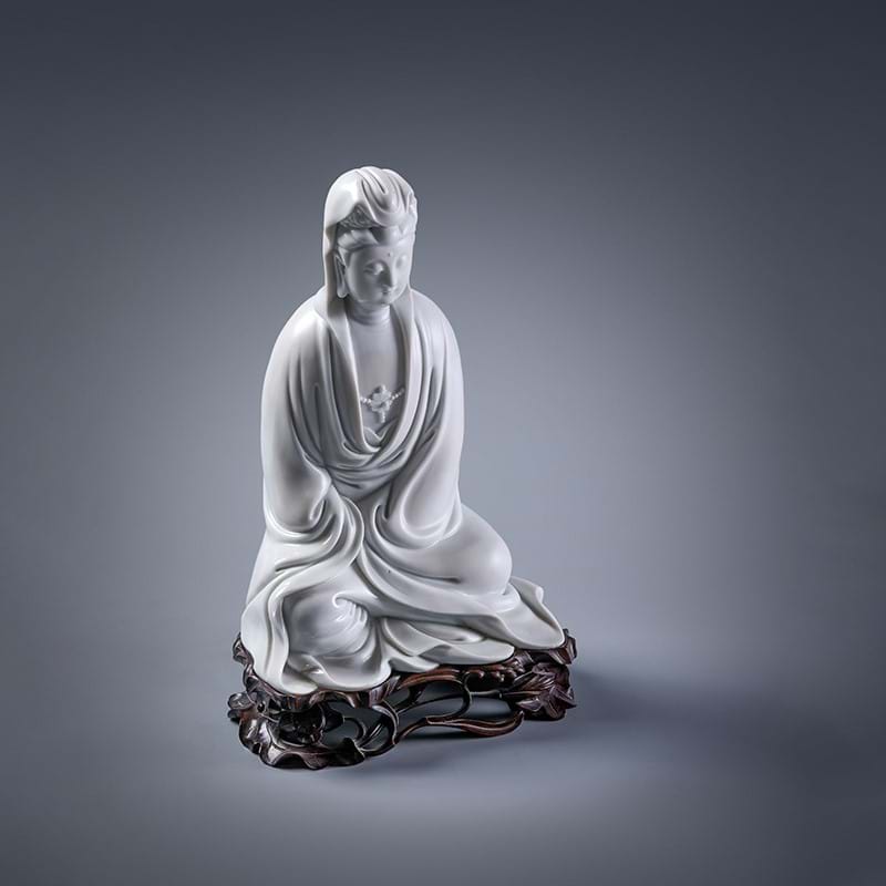 A rare Chinese Dehua model of seated Guanyin, 17th century
