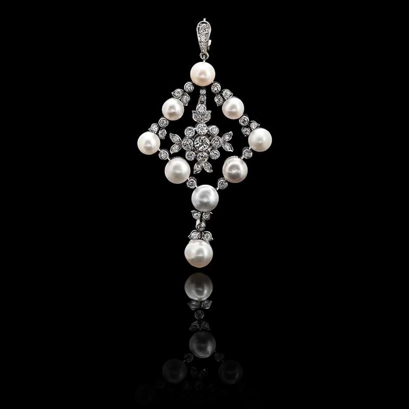 A natural pearl and diamond pendant